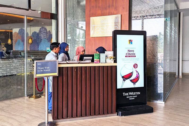 Digital signage kiosk at a restaurant entrance in The Westin Desaru Coast Resort